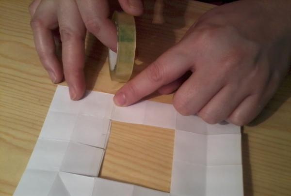 Wie man mit eigenen Händen einen sich verwandelnden Würfel aus Papier herstellt