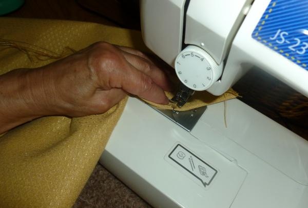 Sewing the cut material