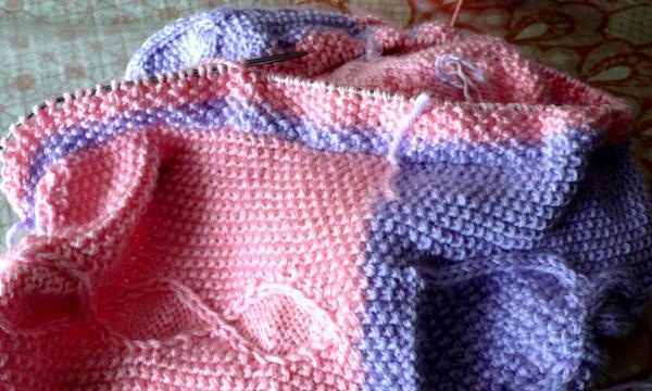 Master class sul lavoro a maglia di una coperta per bambini