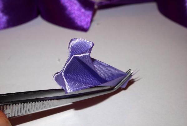 Lush purple satin ribbon bow