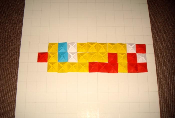 Origami mozaik tekniğini kullanan horoz