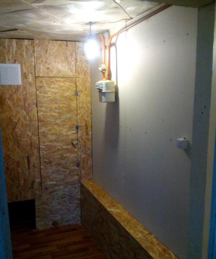 Covering the corridor with plasterboard and slabs