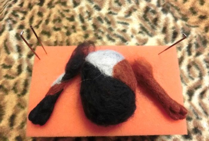 spotted cat made of wool felting