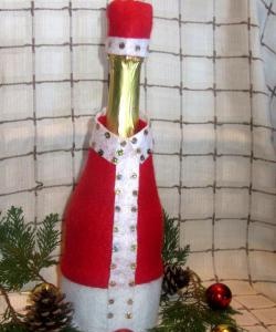 Kerstman op een fles champagne