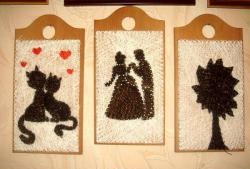 Painting made of threads and nails “A couple of cats in love”