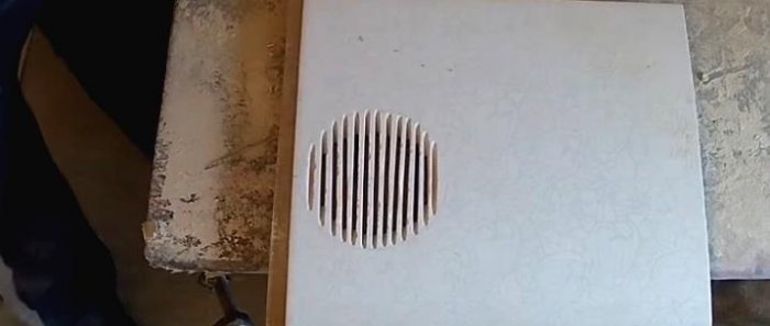 How to cut a hole in a tile with a grinder
