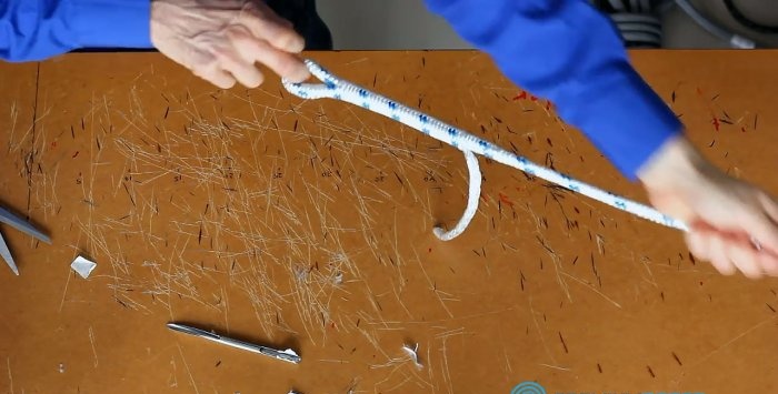 Hvordan lage en vakker løkke på et flettet tau