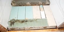 How to quickly and reliably make a threshold for a balcony from leftover plasterboard and tiles