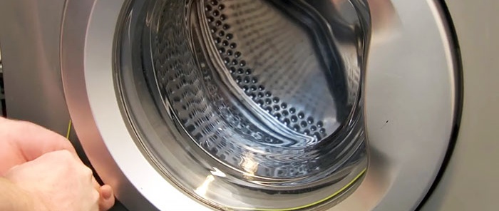 4 måter å åpne vaskemaskindøren hvis den sitter fast