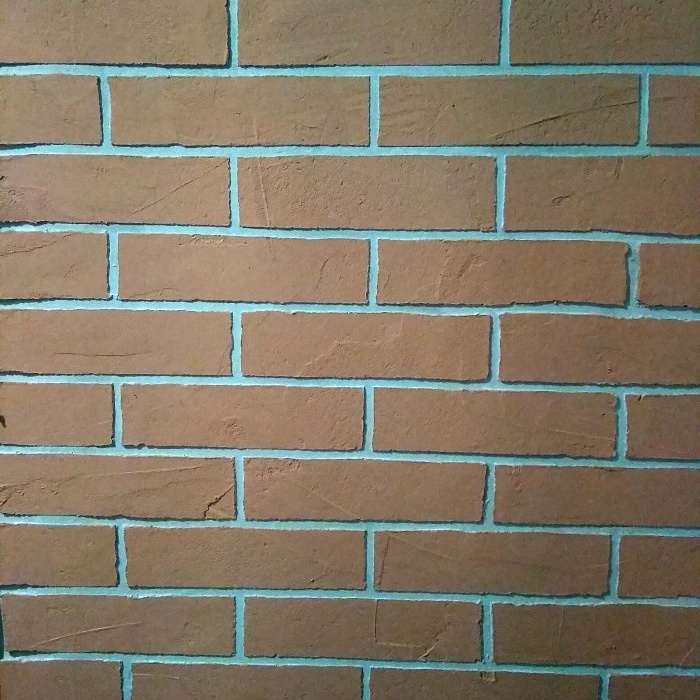 Do-it-yourself pandekorasyon plaster para sa brick
