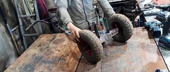 DIY tranšeju racējs izgatavots no krūmgrieža un salauztas slīpmašīnas
