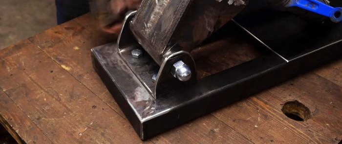 Comment fabriquer une machine de découpe à partir d'une meuleuse d'angle et d'anciens amortisseurs