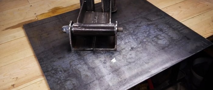 Cómo hacer una máquina cortadora con una amoladora angular y amortiguadores viejos.