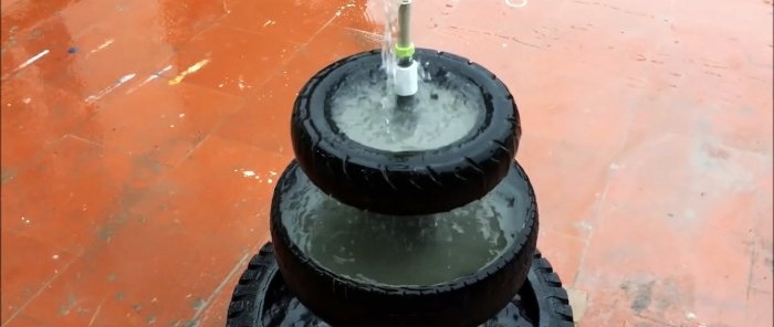 Come realizzare una fontana da giardino a tre livelli con vecchi pneumatici