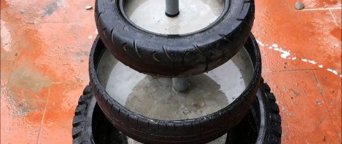 Cómo hacer una fuente de jardín de tres niveles con neumáticos viejos