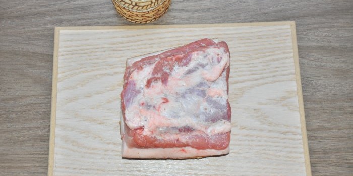 Smoked lard in a sleeve in the oven