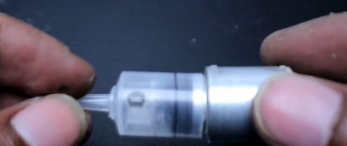 How to make a simple water pump from a motor and a syringe