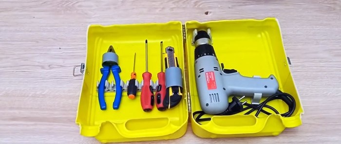 Hvordan lage en praktisk verktøykasse fra en beholder