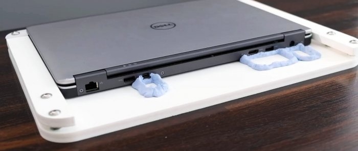 Hoe je een dockingstation voor een laptop maakt zonder voortdurend een heleboel draden aan te sluiten