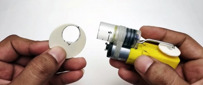 How to make a miniature compressor from a syringe and a machine gearbox
