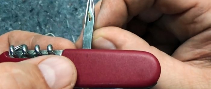 Hvordan sy med en sveitsisk kniv