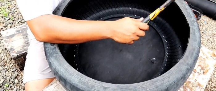 كيفية صنع خزان مياه من إطار قديم