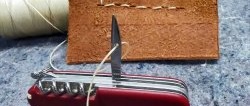 Wie man mit einem Schweizer Messer näht