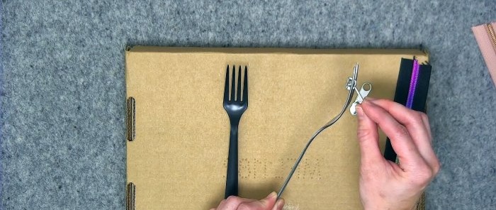Hvordan vikle en glidelås med en gaffel uten problemer