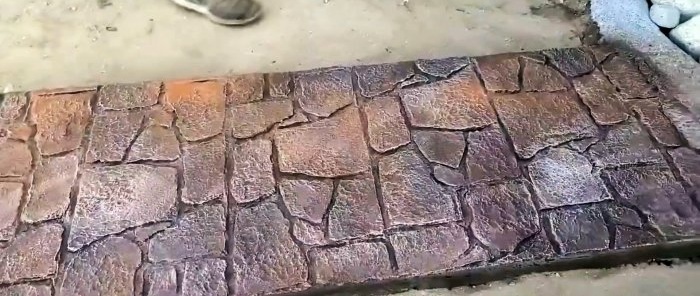 Hur man gjuter en trädgårdsgång i betong med imiterad sten