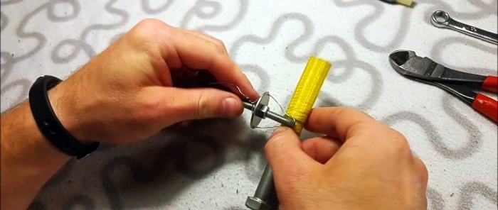 كيفية صنع مشبك بسيط من أدوات التثبيت التي اشتريتها من المتجر