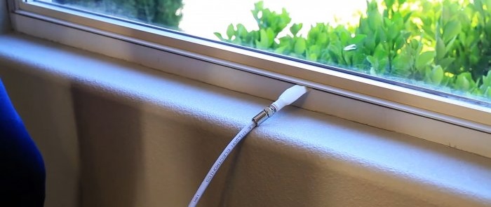 Bagaimana untuk menjalankan kabel TV dari jalan melalui tingkap tanpa menggerudi