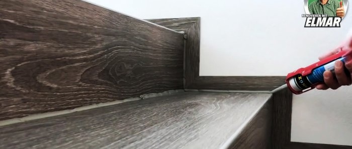 Cómo decorar bellamente una escalera de madera con baldosas vinílicas