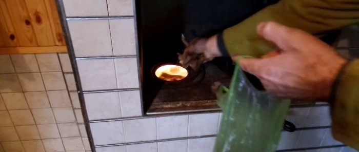 An old-fashioned method of contactless cleaning of a stove chimney