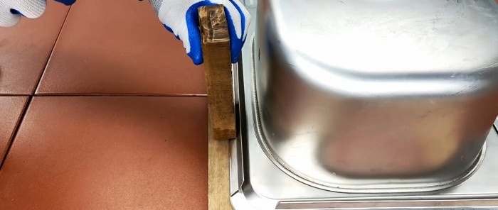 Comment fabriquer un simple poêle à bois à partir d'un évier de cuisine