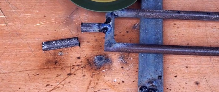 Come realizzare un dispositivo per tessere una rete di maglie di catena da filo di acciaio da 4 mm