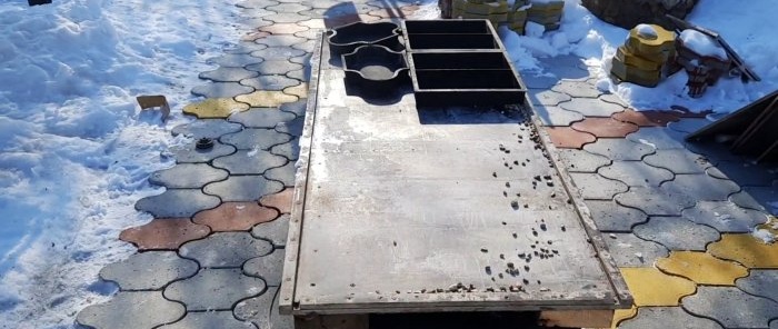 The most affordable do-it-yourself vibrating table made from a tire door and a washing machine engine