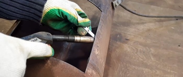 Hoe maak je een kachel voor een ketel uit een gasfles