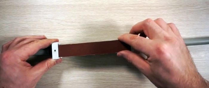 Cum să asamblați o structură pentru ascuțirea cuțitelor din materialele disponibile