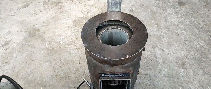 Comment fabriquer un poêle à bois 2 en 1 à partir d'une bouteille de gaz avec chauffage de l'eau en parallèle