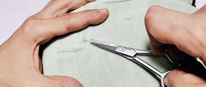Hoe je stilletjes een gat in kleding kunt naaien